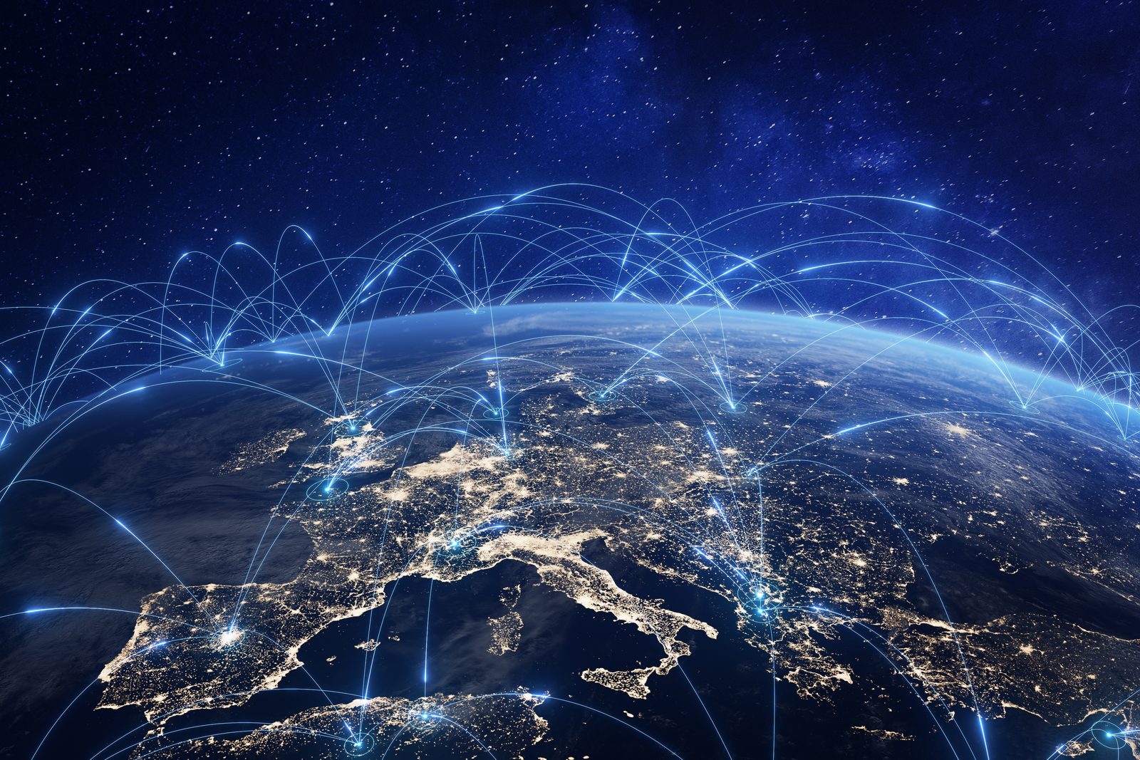 Europe seen from space at night, with lines of light linking its cities